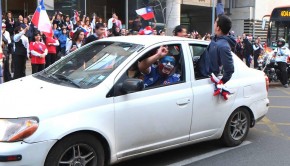 A La U fan celebrates Chile's victory. Photo: Vasilios Devletoglou